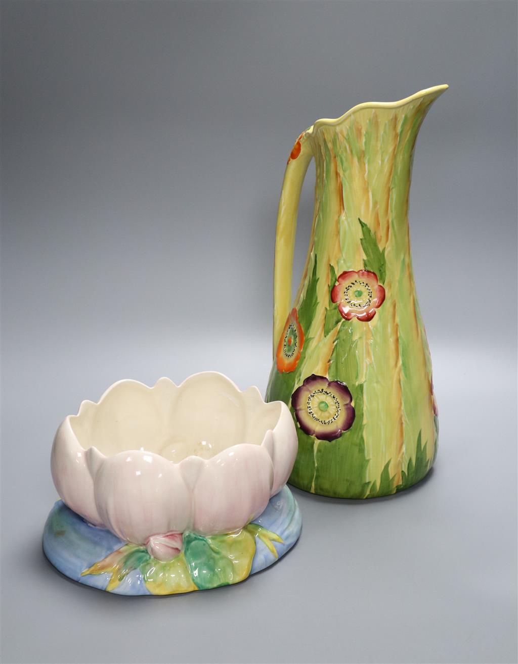 A Clarice Cliff Lilly Pad planter and a large Carltonware jug, 37cm